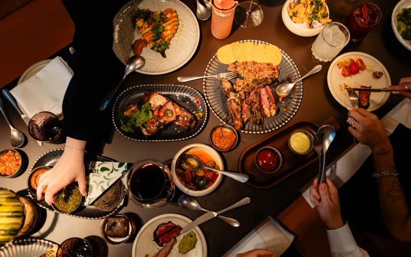 Sharing dinner table with food